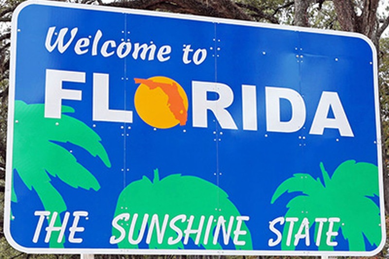 welcome to florida, the sunshine state sign